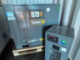 two air compressors sitting next to each other on a pallet