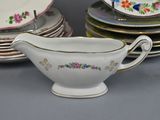 a white gravy with a floral design on it