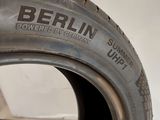 a close up of a tire with the word berlin written on it