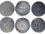 On voit ici six pièces d'argent de formes et de tailles différentes