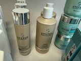 many different types of skin care products sitting on a counter