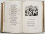 an open book with a picture of a man on a horse