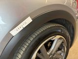 a close up of a car with a sticker on the side of it