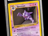 a close up of a pokemon card on a black background