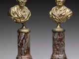 paire de bustes en bronze et en marbre représentant un homme et une femme