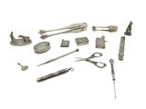 many different types of metal objects on a white background
