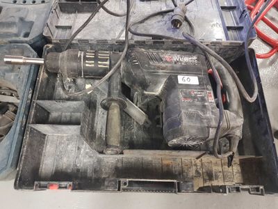 an image of a tool box with a hammer and other tools in it