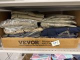 a box full of clothes on a shelf in a store
