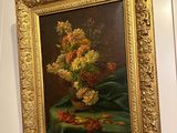 a picture of a painting hanging on the wall