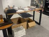 a room with a desk and a chair in it