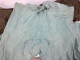 a pair of pants that are sitting on the floor