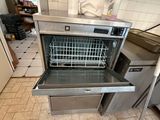 a stainless steel oven that is open in a kitchen