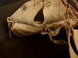 a pair of shoes that have been left in a suitcase