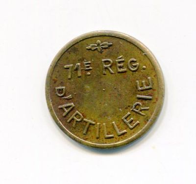 an old coin with the word ' the reg ' written on it