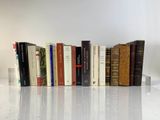 a lot of books that are sitting on a table