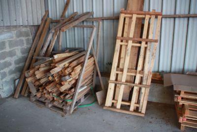 many pieces of wood stacked on top of each other