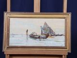 un tableau posé sur un chevalet représentant un homme dans un bateau