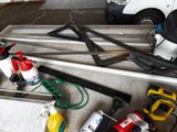 a lot of tools that are laying out on the floor