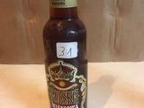a bottle of beer that is sitting on a table