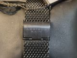 an image of a close up of a wrist with a watch on it