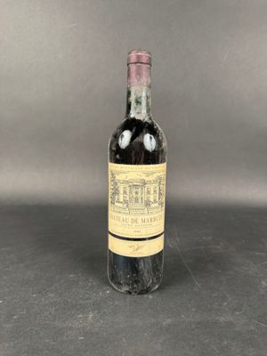 a bottle of wine sitting on top of a table