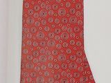 an image of a red necktie with a pattern on it