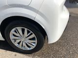 a white car parked on the side of the road