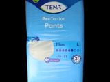 a close up of a bag of tena protection pants on a black background