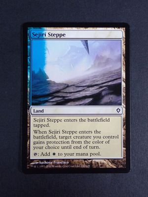 a close up of a card with a picture of a wave on it