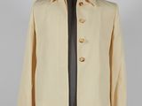 an image of a beige coat on a mannequin mannequin