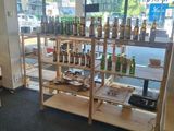 a shelf with bottles of liquor on it in a store