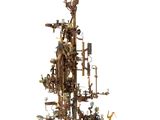 a very large metal tree with lots of different things on it