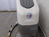 a machine that is sitting in the corner of a room