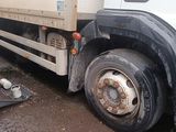 a truck that is parked on the side of the road
