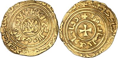 a gold coin with a cross on the front and a cross on the back