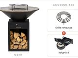 a close up of a grill with a bunch of wood in it
