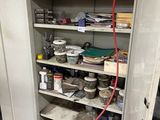 a cabinet that has a bunch of items in it