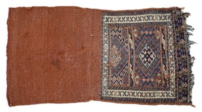 a close up of an old rug with fringes on it