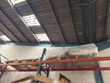 a large amount of boxes on the shelves in the warehouse