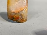 a piece of rock that is sitting on top of a table