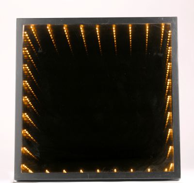 a picture of a square mirror with lights in it