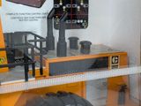 a toy truck that is sitting in a display case