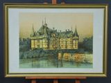 painting of a castle on a small easel in front of a blue wall