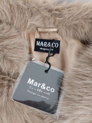 a close up of a coat with a tag on it