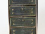 an image of a green and gold chest of drawers on a stand
