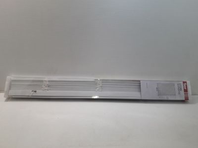 a stack of white sticks sitting on a table