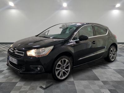 the black citrole is parked on a checkered tile floor