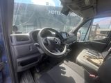 a view of the inside of a vehicle from the driver ' s seat