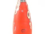 a red vase with a design on it on a white background