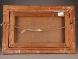 an old wooden picture frame with a rope and a piece of paper in it